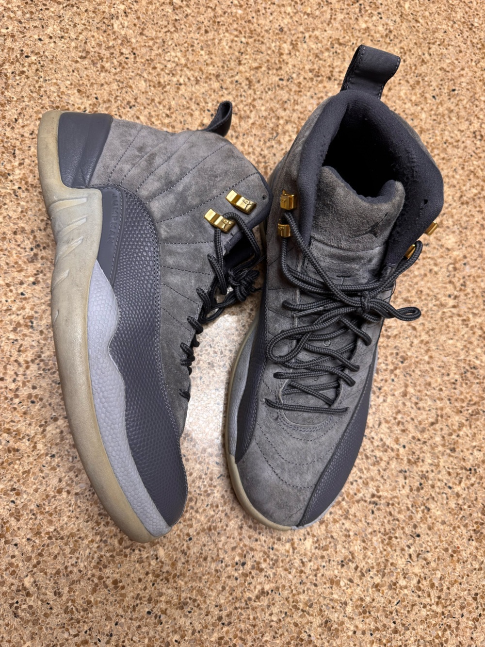 Air Jordan 12 Retro High-Top Sneakers in Dark Gray with Gold Accents